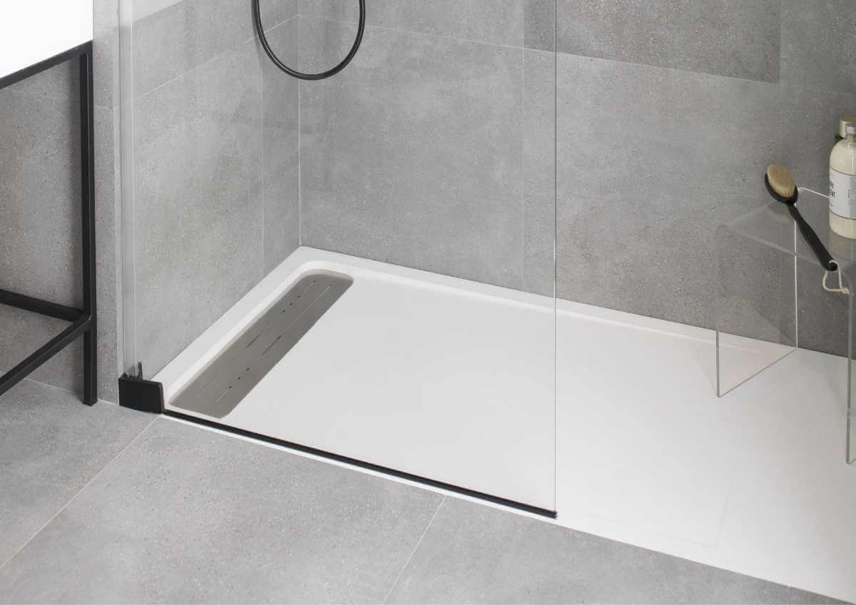 Piatto doccia minimalista a filo pavimento Attica Krion